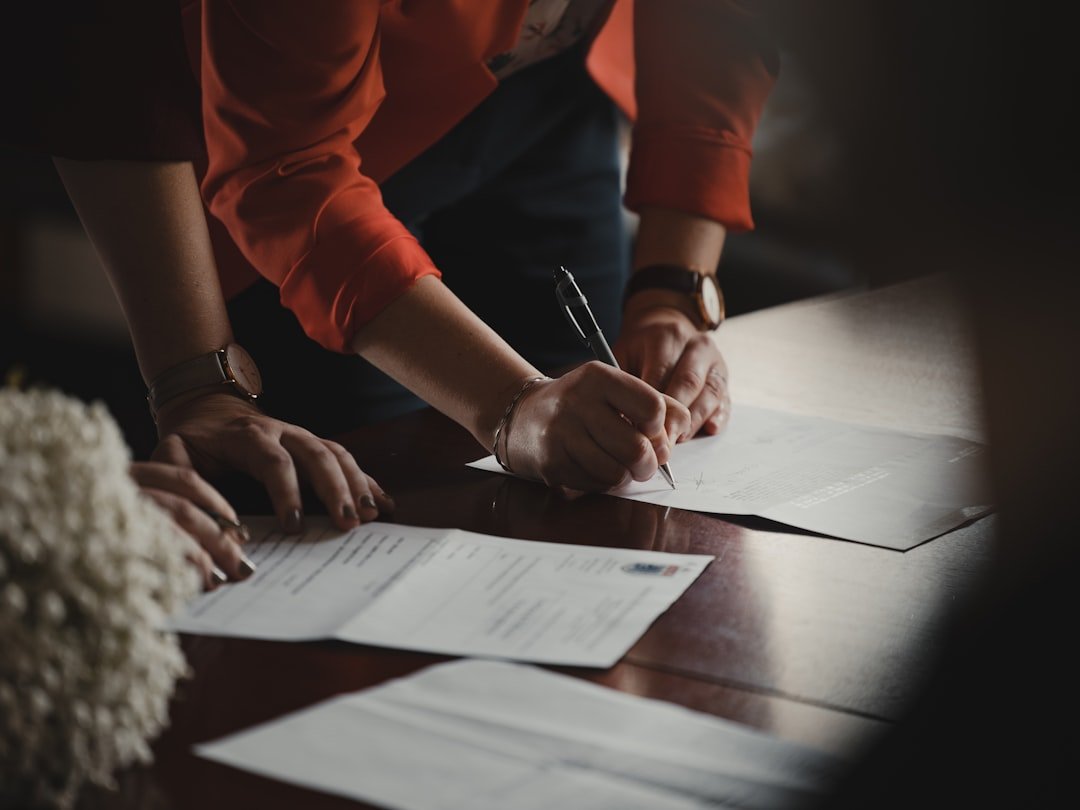 Professional reviewing compliance documentation