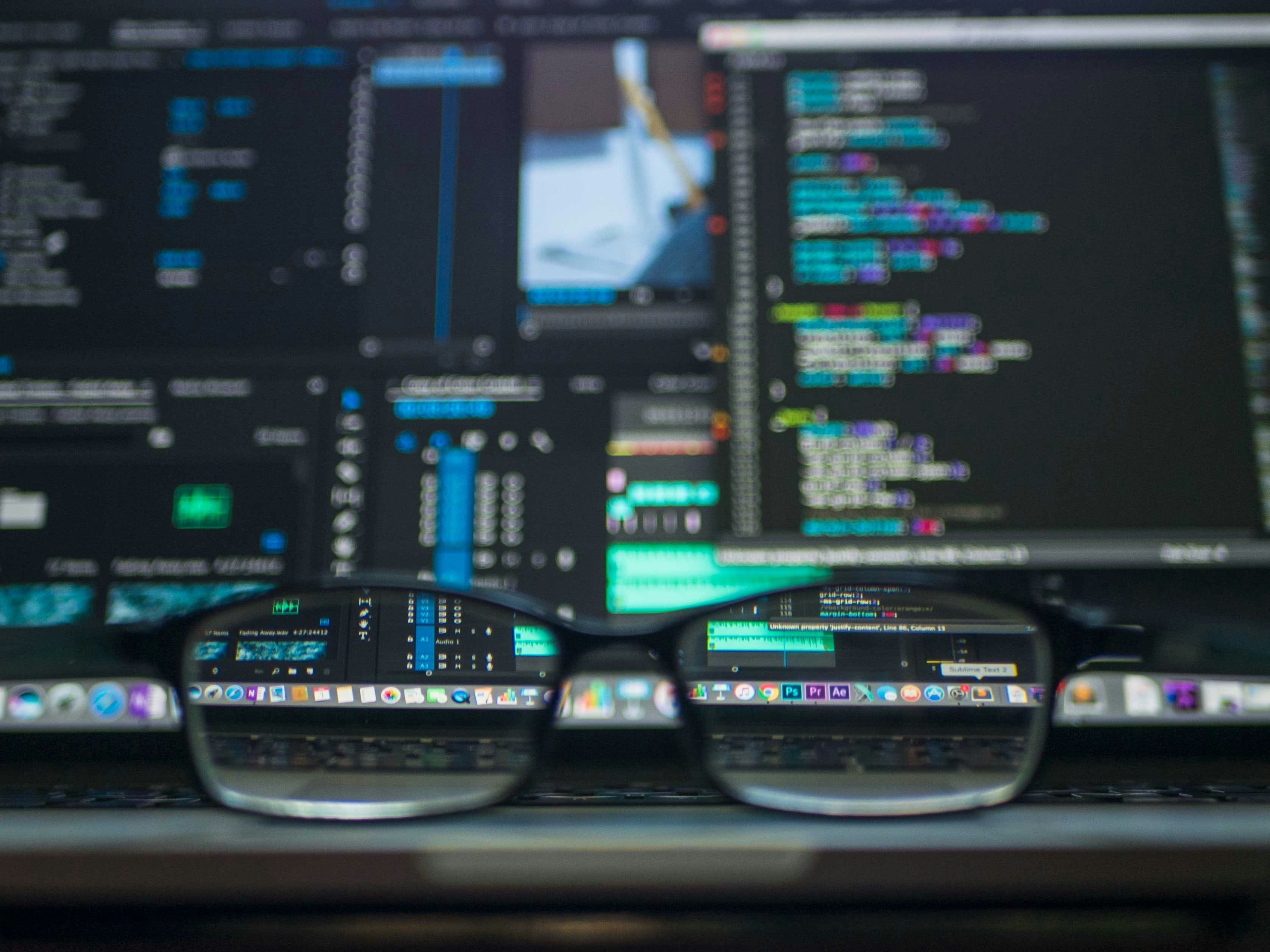 Developer reviewing code through glasses